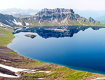 The lake in the caldera of a volcano in Kamchatka