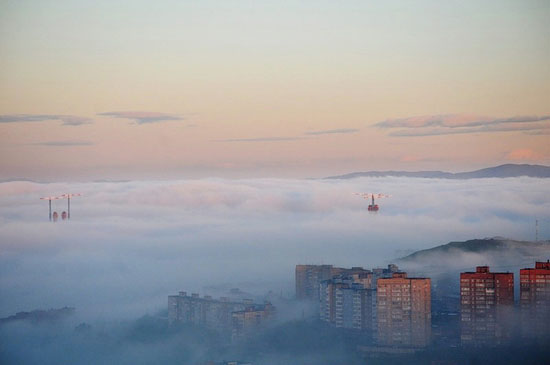 Mysterious fog over Vladivostok city, Russia view 8